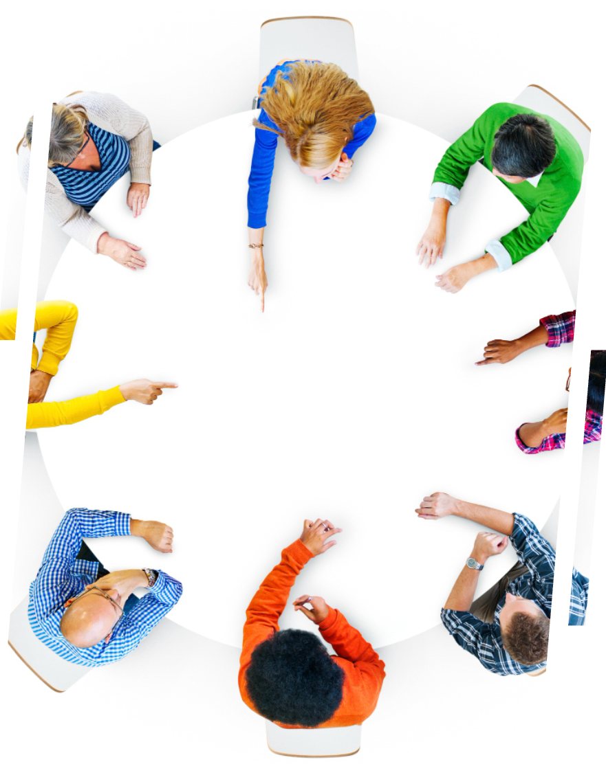 Overhead view of professionals gathered around a round table, collaborating